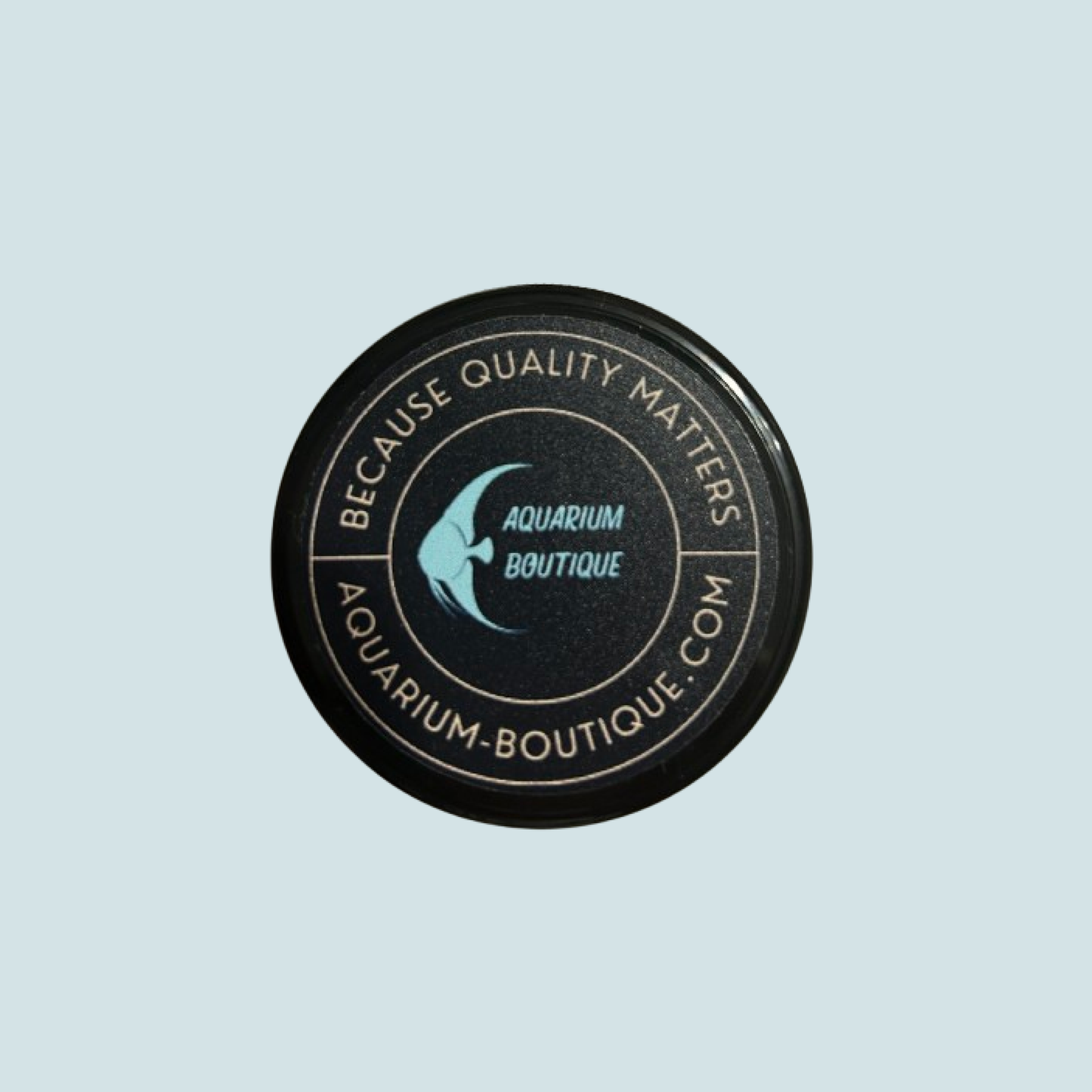 Picture of a containter of Artemia Nibbles - Soft Granule for fishes, taken from above and showing the cap with label and text "Because quality matters" - Aquarium Boutique